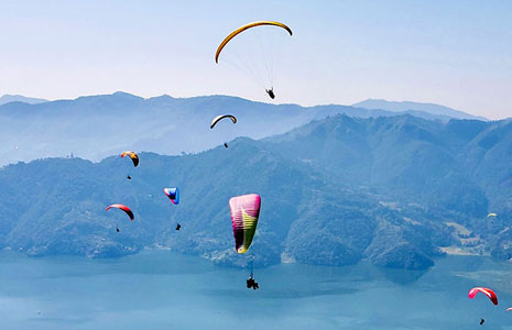 Paragliding over Nepal’s mountains – Nepal tour package for Indian adventure seekers