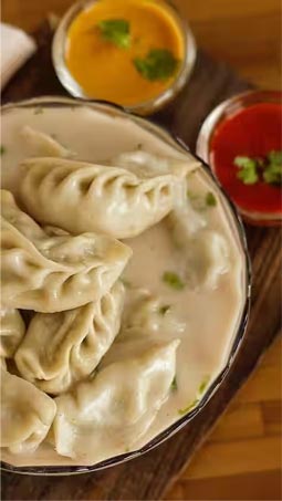 Nepali momos in white sauce – Nepal Tour Package for Indian travelers